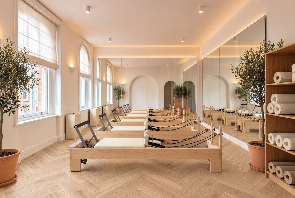 Daytona Natural Oak Herringbone flooring in a Pilates studio, room visualisation